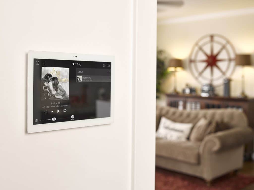 Control4 multi-room audio system playing music in a living room