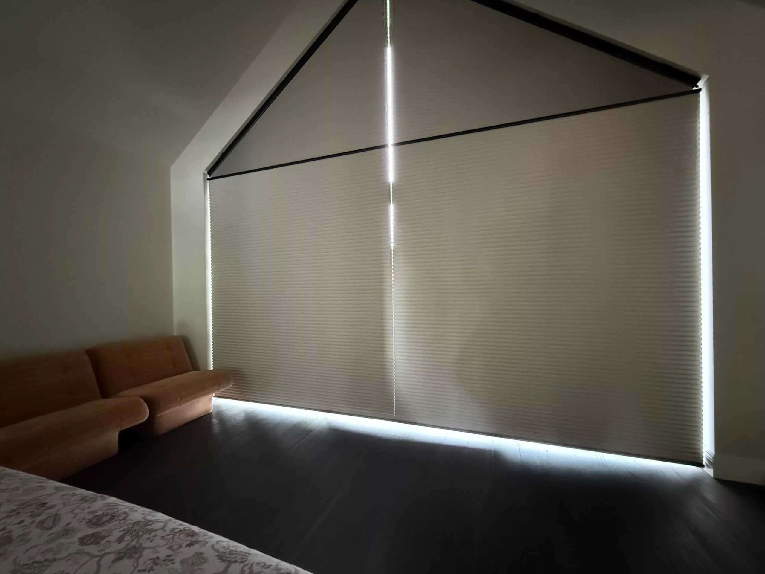 Floor-to-ceiling motorised curtains in a modern living room